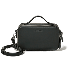 Black vegan leather crossbody bag with silver hardware sits against a white background.