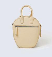 Load image into Gallery viewer, Cream and snake print vegan leather oval round shoulder handbag with silver hardware photographed against a white background with the Global Recycled Standard logo.
