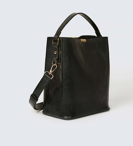 Black vegan leather shoulder bag with the photographed against a white background.