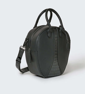 Black vegan leather oval round shoulder handbag with gunmetal hardware photographed against a white background.