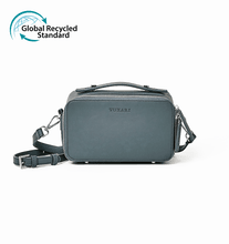 Load image into Gallery viewer, Teal blue vegan leather crossbody bag with silver hardware and the Global Recycled Standard logo photographed against a white background.
