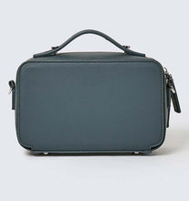 Load image into Gallery viewer, The back of a teal vegan leather crossbody bag with clutch handle.
