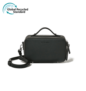Black vegan leather crossbody bag with the Global Recycled Standard logo photographed against a white background.