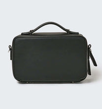 Load image into Gallery viewer, The back of a black vegan leather crossbody bag with the Global Recycled Standard logo photographed against a white background.
