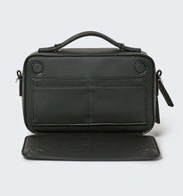 Load image into Gallery viewer, Black vegan leather crossbody bag showing a hidden wallet card compartment with the Global Recycled Standard logo photographed against a white background.
