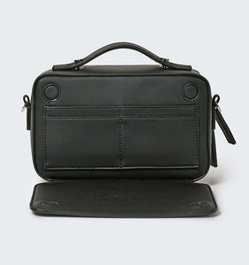 Black vegan leather crossbody bag showing a hidden wallet card compartment with the Global Recycled Standard logo photographed against a white background.